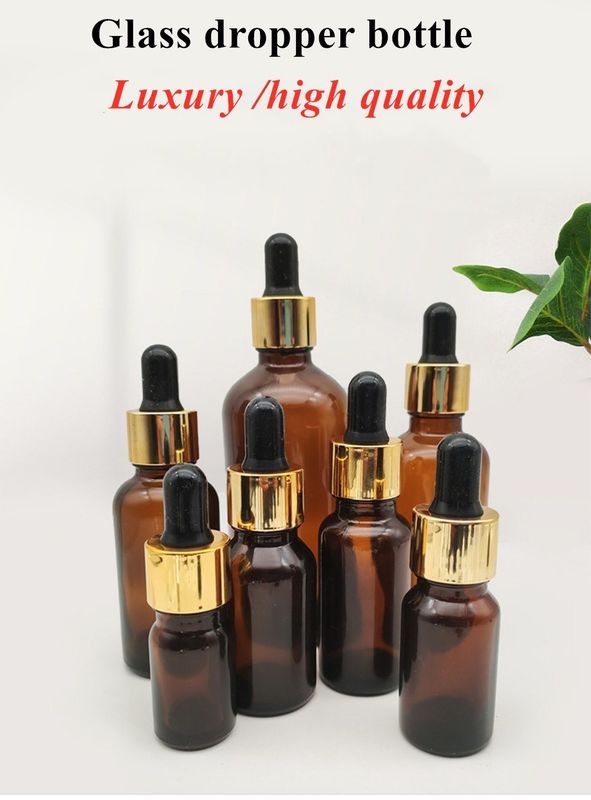 فروش داغ 5ml 10ml 15ml 30ml 50ml آب سرم امبر بطری های روغن ضروری بطری های قطره کش شیشه ای