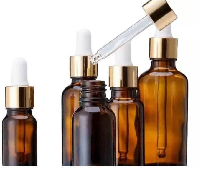 بسته بندی روغن ضروری 1OZ 2OZ 20ml 30ml 50ml سرم روغن ضروری زردچوبه بطری قطره ای شیشه ای با کاپ ضد بچه