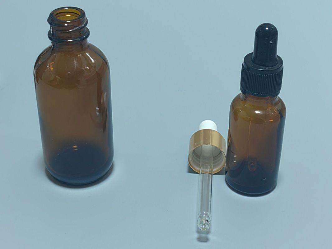 بسته بندی روغن ضروری 1OZ 2OZ 20ml 30ml 50ml سرم روغن ضروری زردچوبه بطری قطره ای شیشه ای با کاپ ضد بچه