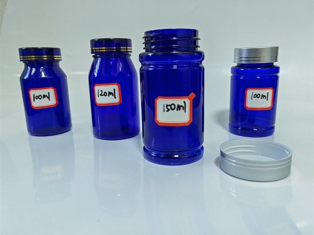 بطری کپسول 100 میلی لیتر پلاستیکی آبی PET با کلاه پیچ نقره ای
